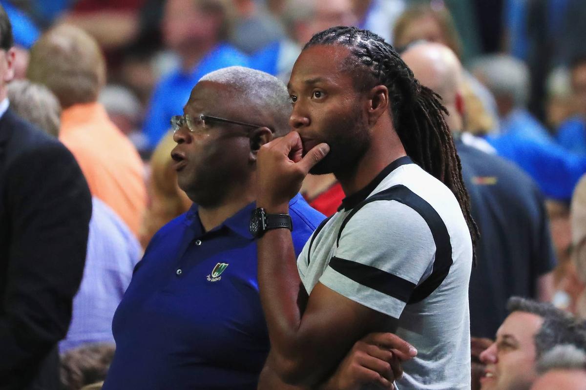  GLENDALE, AZ - APRIL 01: NFL player Larry Fitzgerald of the Arizona Cardinals (R) and Larry Fitzgerald Sr. attend the game between the North Carolina Tar Heels and the Oregon Ducks during the 2017 NCAA Men's Final Four Semifinal at University of Phoenix Stadium on April 1, 2017 in Glendale, Arizona. (Photo by Ronald Martinez/Getty Images) 