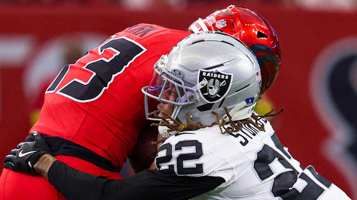  Dec 21, 2025; Houston, Texas, USA; Las Vegas Raiders cornerback Eric Stokes (22) tackles Houston Texans wide receiver Christian Kirk (13) in the first half half at NRG Stadium. Mandatory Credit: Thomas Shea-Imagn Images | Thomas Shea-Imagn Images 