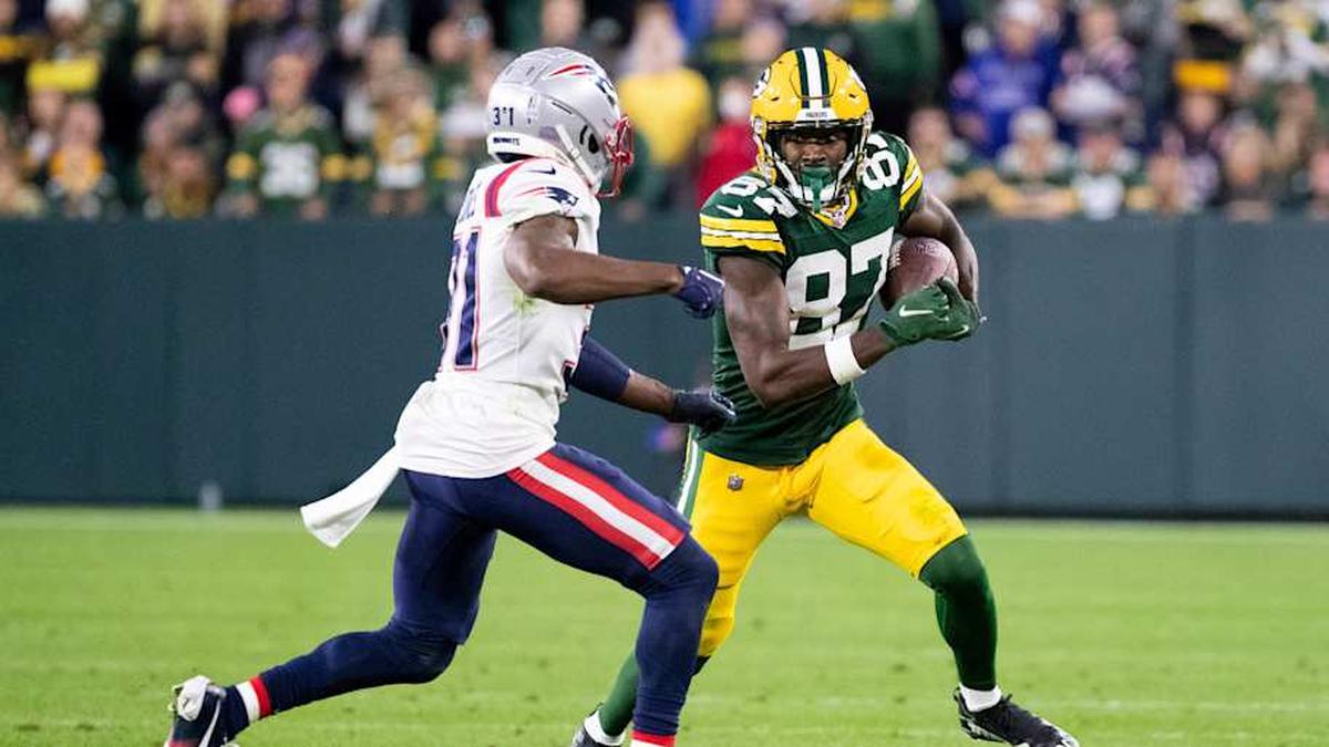  Green Bay Packers wide receiver Romeo Doubs (87) runs the ball against New England Patriots cornerback Jonathan Jones (31) in overtime on Sunday, Oct. 2, 2022, at Lambeau Field in Green Bay, Wis. Samantha Madar/USA TODAY NETWORK-Wis. Gpg Packers Vs Patriots 10022022 0004 | Samantha Madar/USA TODAY NETWORK-Wisconsin / USA TODAY NETWORK 