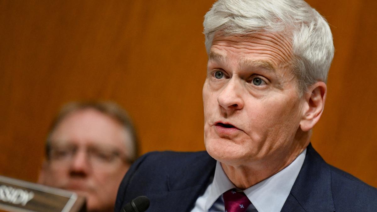 FILE PHOTO: U.S. Senator Bill Cassidy looks on as U.S. Health and Human Services Secretary Robert F. Kennedy Jr. testifies before a Senate Health, Education, Labor, and Pensions Committee hearing on U.S. President Donald Trump's budget request for the Department of Health and Human Services on Capitol Hill in Washington, D.C., U.S., April 22, 2026. REUTERS/Annabelle Gordon/File Photo