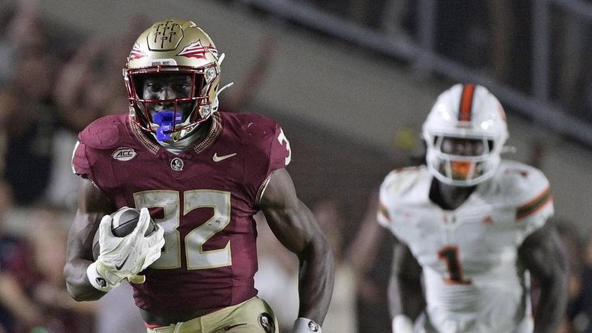  Oct 4, 2025; Tallahassee, Florida, USA; Florida State Seminoles running back Ousmane Kromah (32) runs during the first half against the Miami Hurricanes at Doak S. Campbell Stadium. Mandatory Credit: Melina Myers-Imagn Images | Melina Myers-Imagn Images 