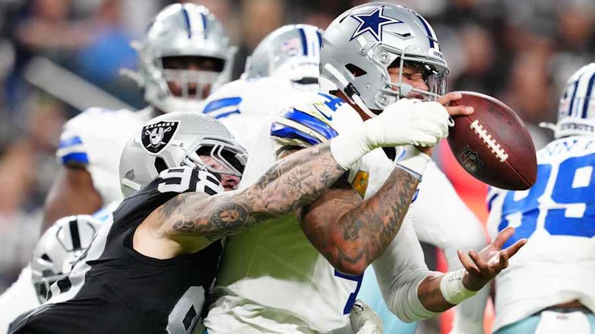  Nov 17, 2025; Paradise, Nevada, USA; Las Vegas Raiders defensive end Maxx Crosby (98) forces a fumble by Dallas Cowboys quarterback Dak Prescott (4) during the first half at Allegiant Stadium. Mandatory Credit: Stephen R. Sylvanie-Imagn Images | Stephen R. Sylvanie-Imagn Images 
