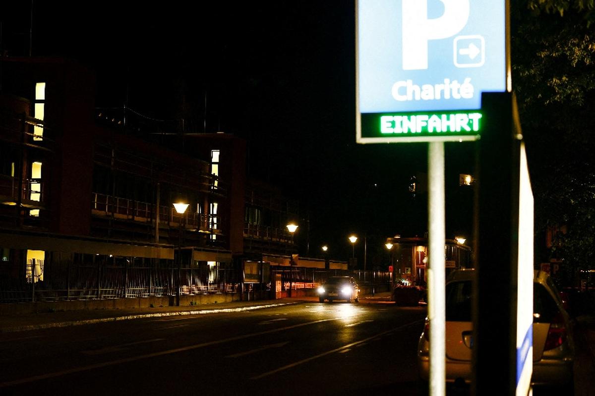 A car drives near the Charite University Hospital, where a U.S. citizen who contracted Ebola in the Democratic Republic of Congo would be admitted to a special isolation ward, according to Germany's health ministry, in Berlin, Germany, May 20, 2026.    REUTERS/Axel Schmidt