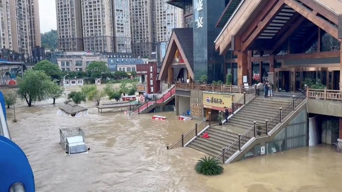 A vehicle partially submerged in floodwaters after heavy rainfall in Duyun, Guizhou Province, China, May 19, 2026, in this still image obtained from a social media video. Social Media/via REUTERS
