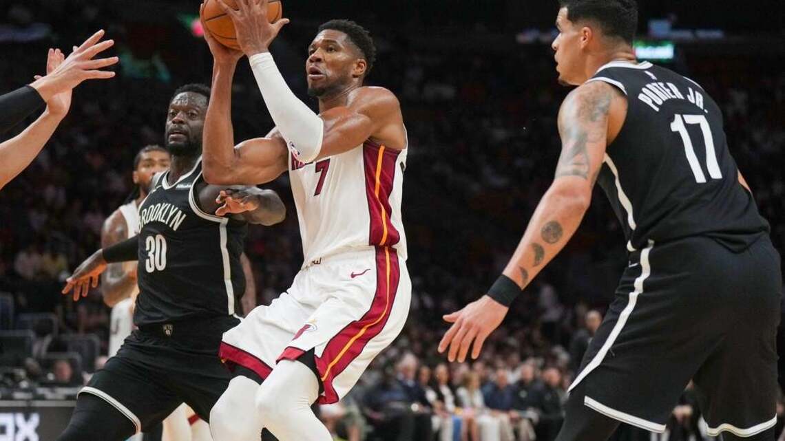 After blockbuster trades, new-look Heat and Wolves clash in Miami   