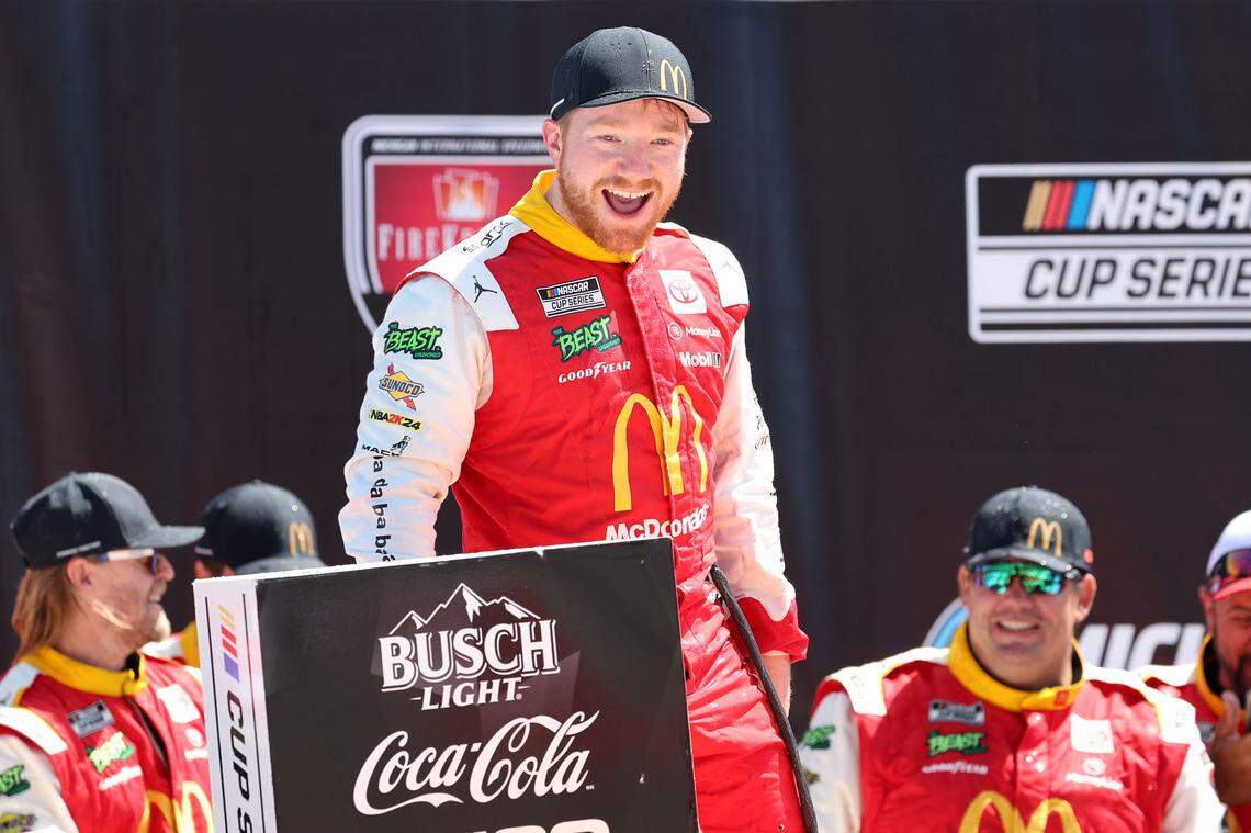 Aug 19, 2024; Brooklyn, Michigan, USA; NASCAR Cup Series driver Tyler Reddick (45) reacts after winning the Fire Keepers 400 at Michigan International Speedway