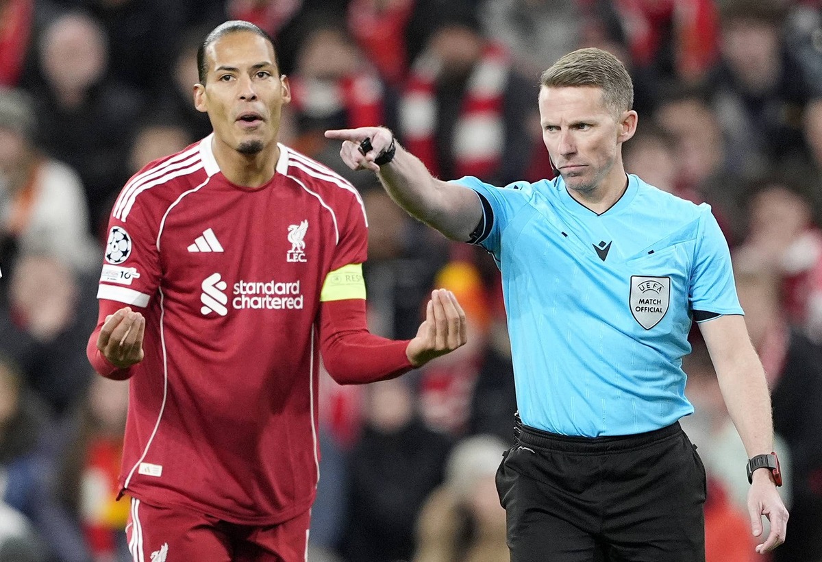  Referee Alejandro Hernandez Hernandez awards a penalty to PSV after Liverpool's Virgil van Dijk handles the ball in the penalty area during a UEFA Champions League match. Photo by Peter Byrne/PA Images via Getty Images