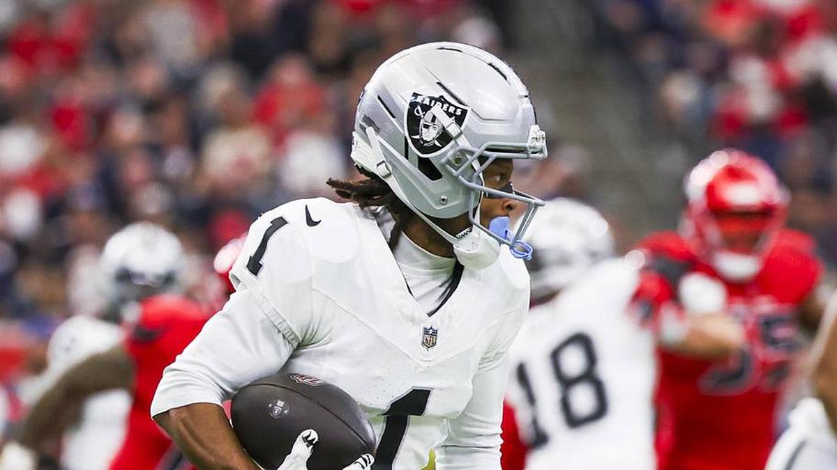  Dec 21, 2025; Houston, Texas, USA; Las Vegas Raiders wide receiver Tre Tucker (1) rushes on a sweep play against the Houston Texans during the first quarter at NRG Stadium. Mandatory Credit: Thomas Shea-Imagn Images | Thomas Shea-Imagn Images 