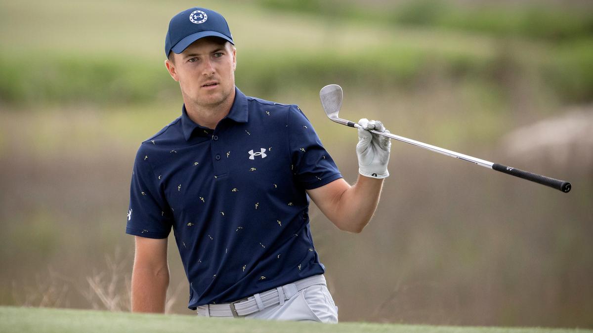 Jordan Spieth watches his shot from a bunker on the 18th hole during a one-hole playoff at the RBC Heritage golf tournament, Sunday, April 17, 2022, in Hilton Head Island, S.C. (AP Photo/Stephen B. Morton)