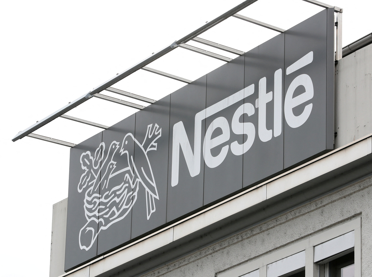 FILE PHOTO: The company's logo is seen at a Nestle plant in Konolfingen, Switzerland September 28, 2020. REUTERS/Arnd Wiegmann?/File Photo