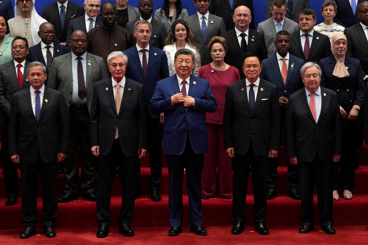 Cambodian Prime Minister Hun Manet, Kazakhstan's President Kassym-Jomart Tokayev, Chinese President Xi Jinping, Thailand Prime Minister Anutin Charnvirakul and UN Secretary-General Antonio Guterres take their positions for a group photo before the opening ceremony for the World AI Conference in Shanghai, China, July 17, 2026.     Ng Han Guan/Pool via REUTERS