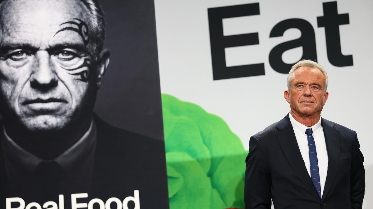 Secretary of Health and Human Services Robert F. Kennedy Jr. stands silently as Agriculture Secretary Brooke Rollins speaks during an event to "Celebrate the Implementation of the Dietary Guidelines for Americans" at the Health and Human Services Headquarters on Feb. 11, 2026, in Washington, D.C. (Michael M. Santiago/Getty Images/TNS)