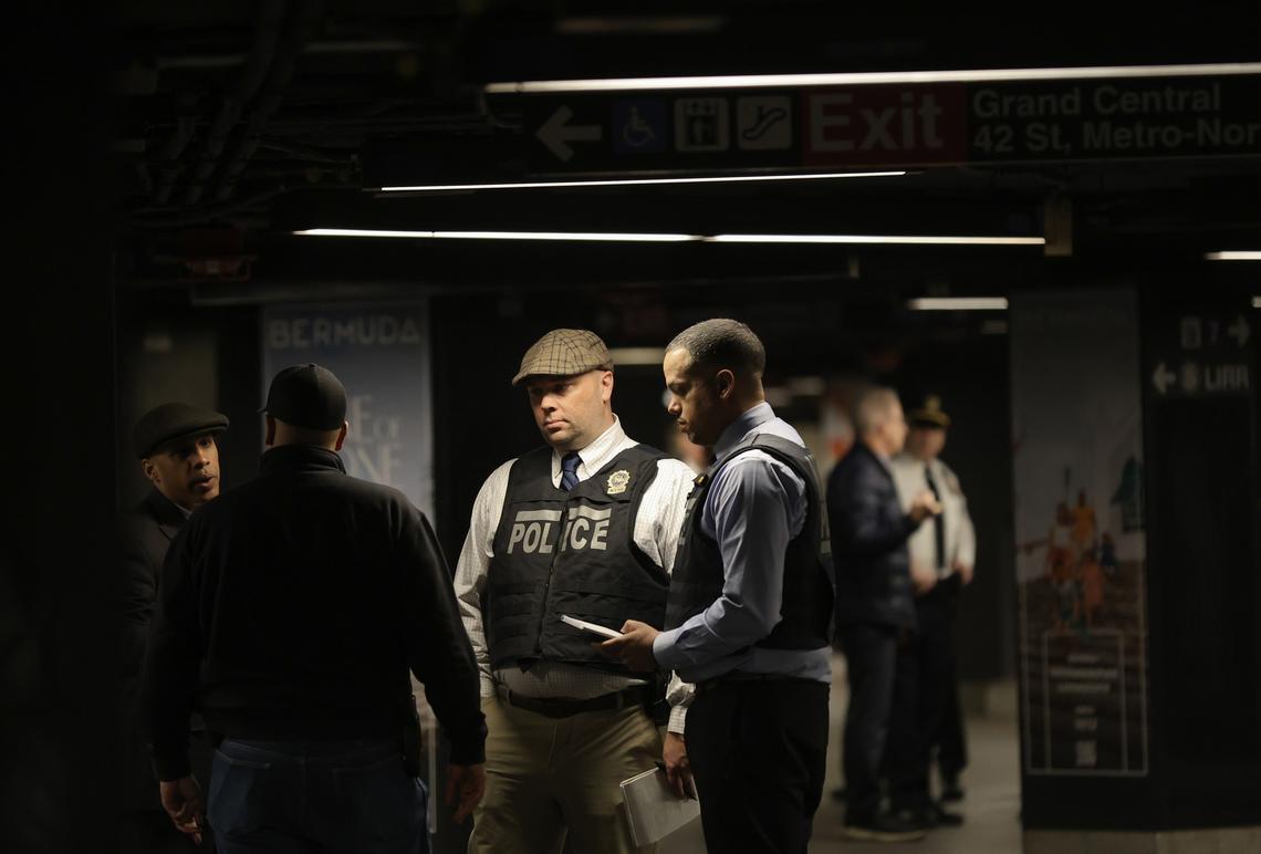 Authorities investigate the subway station at Grand Central Terminal in Manhattan following a reported stabbing and police shooting on Saturday, April 11, 2026. A person was reportedly stabbed in the head on the platform of the uptown 4, 5 and 6 trains; an officer who had been called to the platform then shot the attacker. Both were in critical condition. (Heather Khalifa/The New York Times)