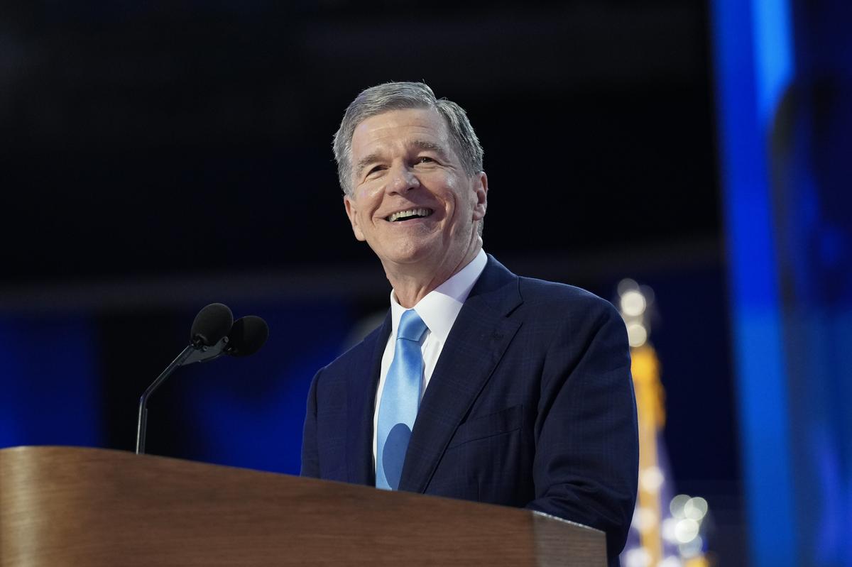  Former North Carolina Governor Roy Cooper speaks during the Democratic National Convention on August 22, 2024, in Chicago. 