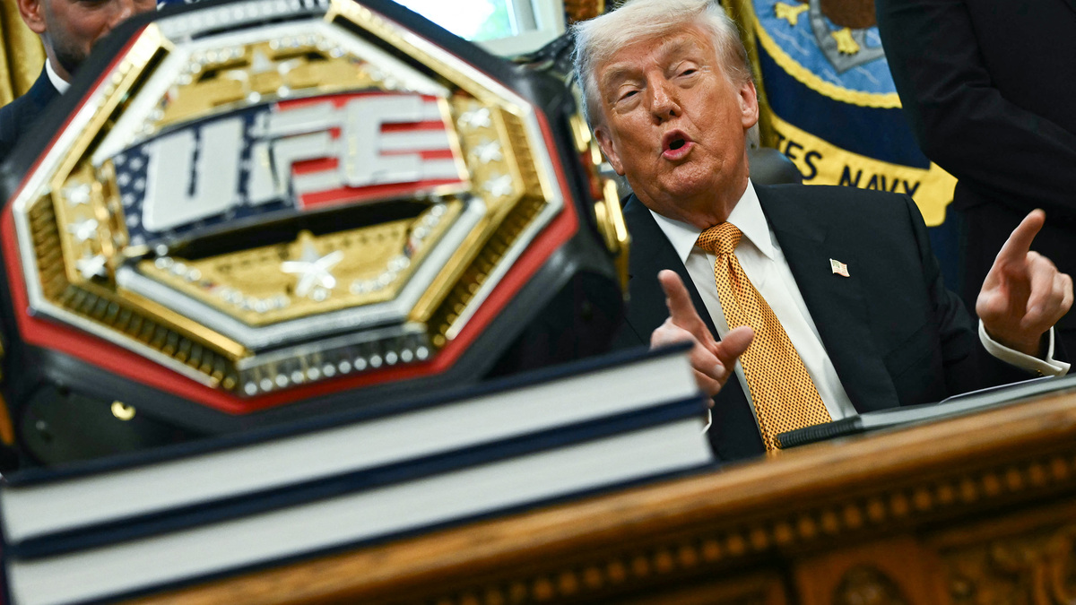 A UFC championship belt is displayed as President Donald Trump speaks about the coming "UFC Freedom 250" event, in the Oval Office of the White House on May 6, 2026, in Washington, D.C. (Kent Nishimura/AFP/Getty Images/TNS)