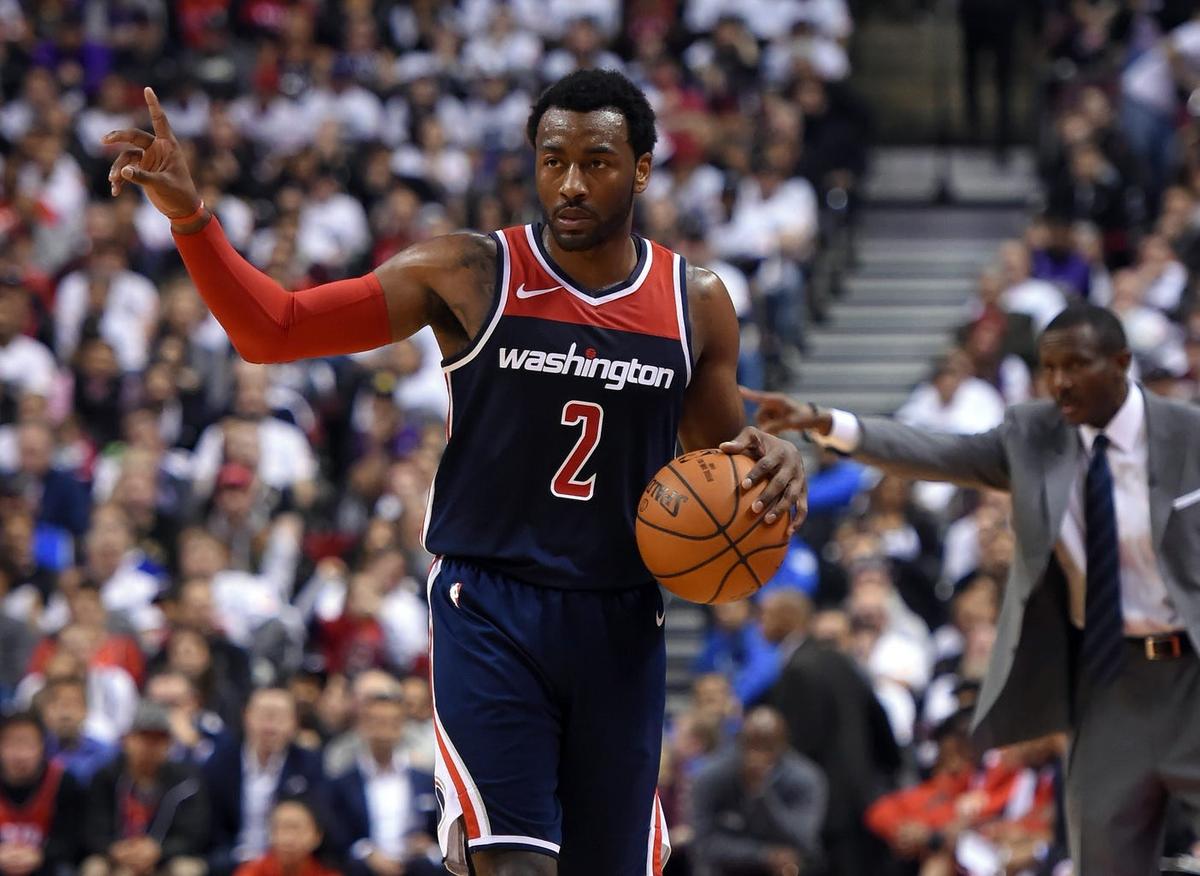 Apr 14, 2018; Toronto, Ontario, CAN;  Washington Wizards guard John Wall (2) gestures to team mates in game one against Toronto Raptors in the first round of the 2018 NBA Playoffs at Air Canada Centre. Mandatory Credit: Dan Hamilton-USA TODAY Sports