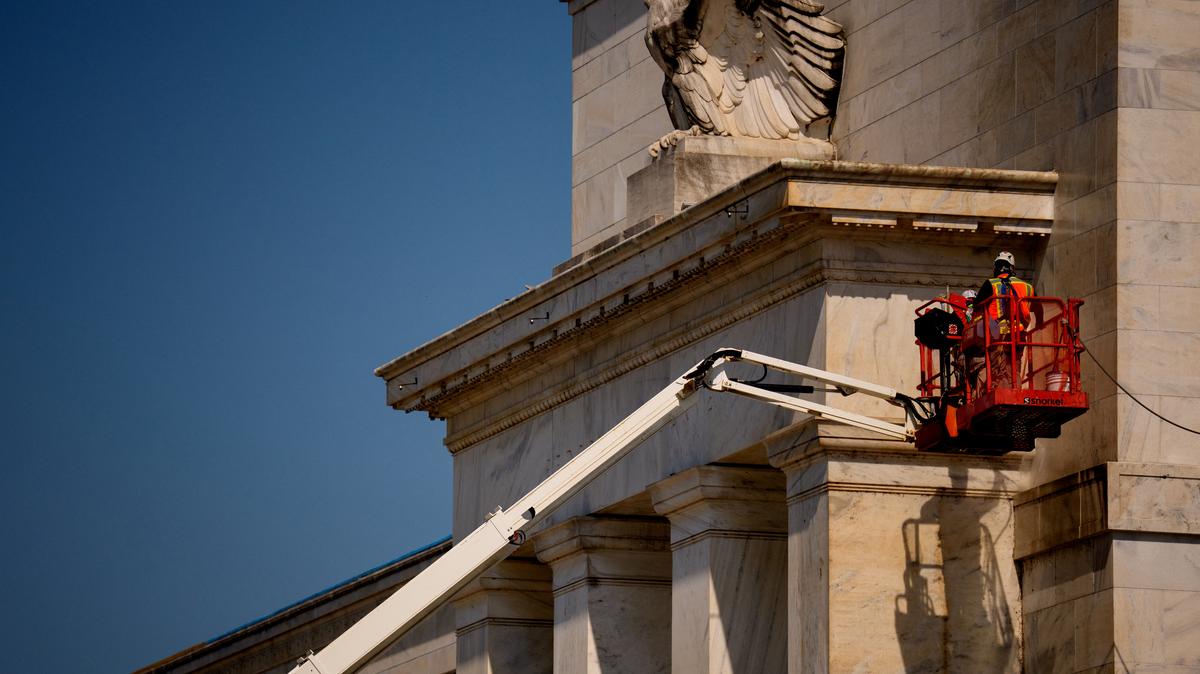 A view shows the front facade of the Marriner S. Eccles Federal Reserve Board Building as a massive renovation continues on the building and the 1951 Constitution Avenue Building, in Washington, D.C., U.S., July 24, 2025. Andrew Harnik/Pool via REUTERS/File Photo