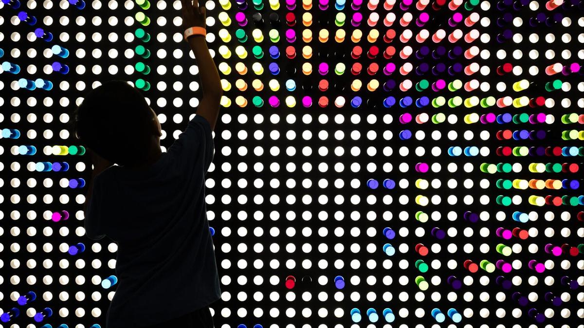 CAMARILLO, CA - MAY 21, 2026: Bryce Baraceros, 5, plays at the light wall at the newly-opened kidSTREAM Children's Museum in Camarillo, CA on Thursday, May 21, 2026. The museum provides an entertaining and educational space. STREAM stands for Science, Technology, Reading, Engineering, Arts and Math. (Myung J. Chun / Los Angeles Times)