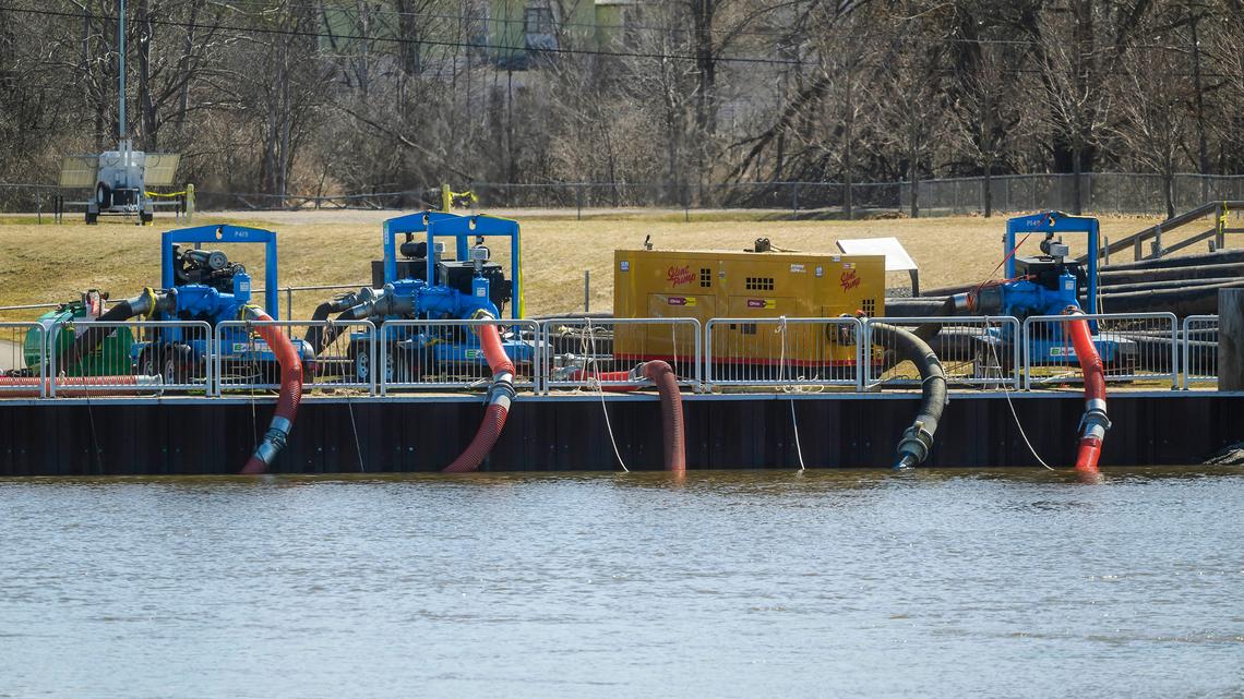Large-volume water pumps are used to divert water from entering the Cheboygan Lock and Dam Complex in Cheboygan, Michigan, on Friday, April 17, 2026. (Katy Kildee/The Detroit News/TNS)