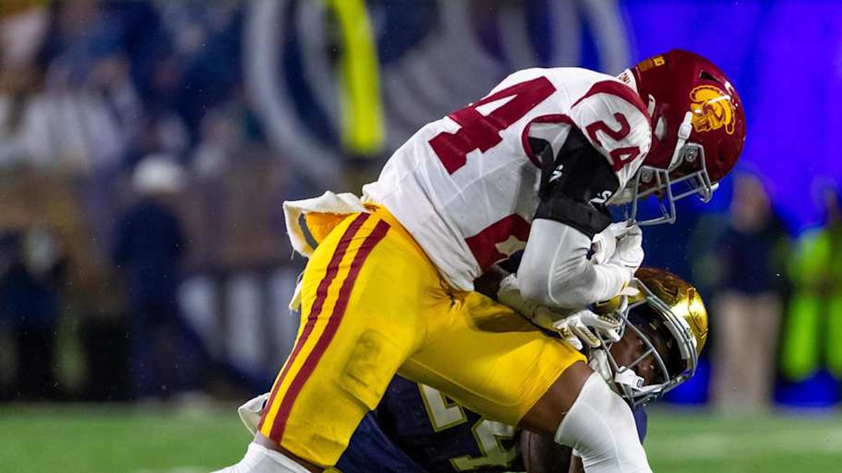  Oct 18, 2025; South Bend, Indiana, USA; Southern California Trojans safety Christian Pierce (24) hits Notre Dame Fighting Irish running back Jadarian Price (24) during the second half at Notre Dame Stadium. Mandatory Credit: Michael Caterina-Imagn Images | Michael Caterina-Imagn Images 
