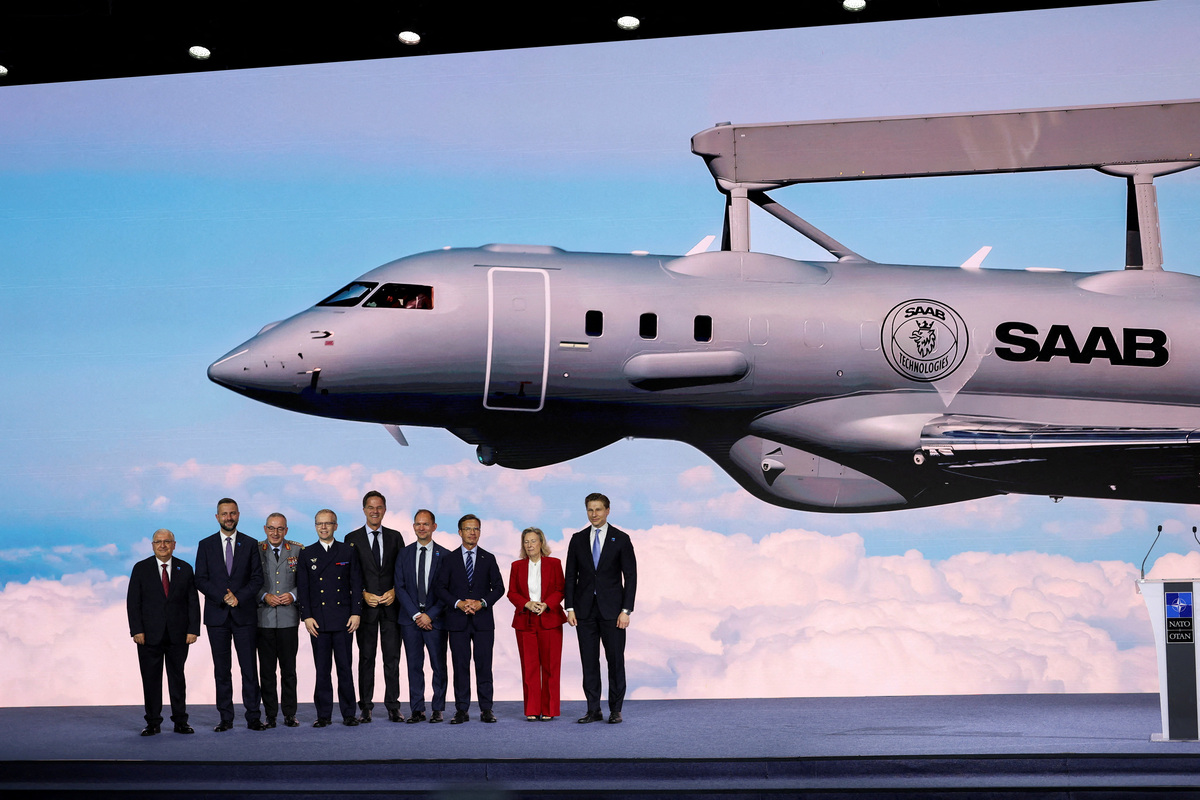 Sweden's Prime Minister Ulf Kristersson and NATO Secretary General Mark Rutte pose for a group photo during the High Level Defence announcements at the NATO Summit Defence Industry Forum, on the sidelines of the NATO leaders' Summit, in Ankara, Turkey, July 7, 2026. REUTERS/Yves Herman