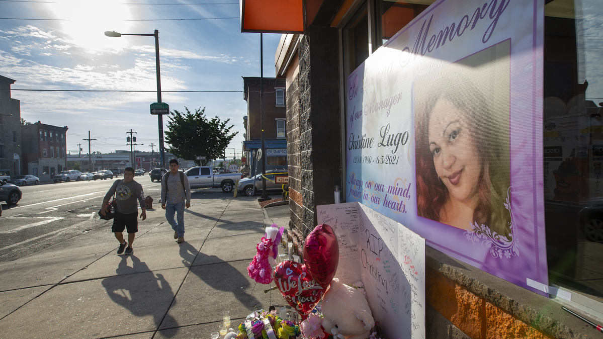A memorial to Christine Lugo, manager at Dunkin' at Lehigh Avenue at 6th St., grew at the store in the aftermath of her June 2021 death. (Alejandro A. Alvarez/The Philadelphia Inquirer/TNS)