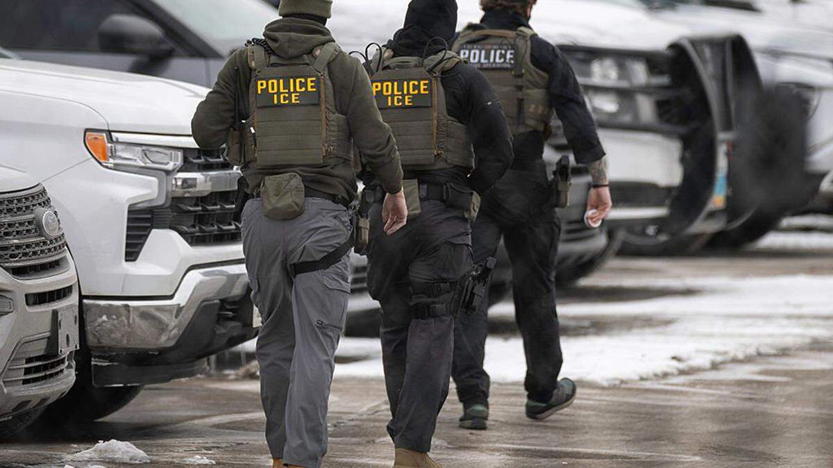 Immigration and Customs Enforcement agents depart the Bishop Henry Whipple Federal Building in Minneapolis on Feb. 4. The House on Wednesday narrowly adopted a Republican budget blueprint to pour an additional $70 billion into immigration enforcement through the remainder of President Donald Trump’s second term.