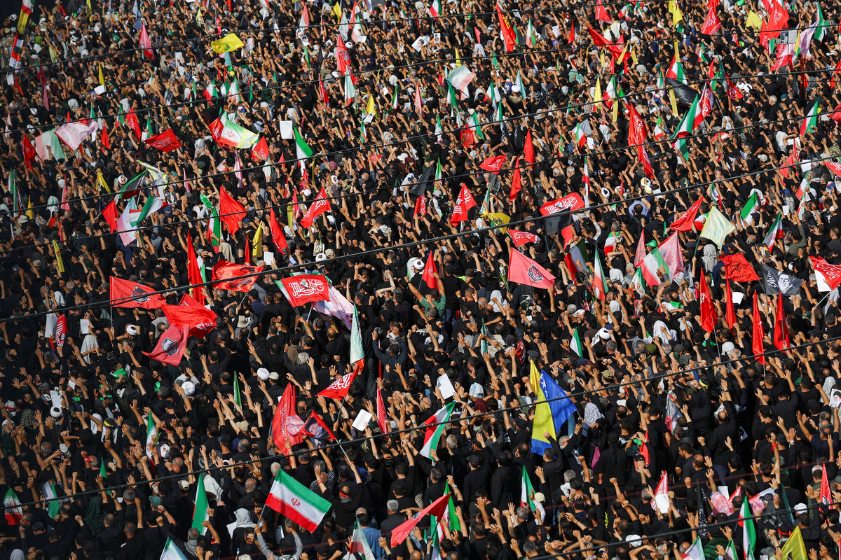 People attend a public farewell ceremony to pay their respects to late Supreme Leader Ayatollah Ali Khamenei, who was killed on February 28 in Israeli and U.S. airstrikes, at the Imam Khomeini Grand Mosalla, in Tehran, Iran July 4, 2026.  REUTERS/Murad Sezer  Foreign media in Iran operate under guidelines set by the Ministry of Culture and Islamic Guidance, which regulates press activity and permissions