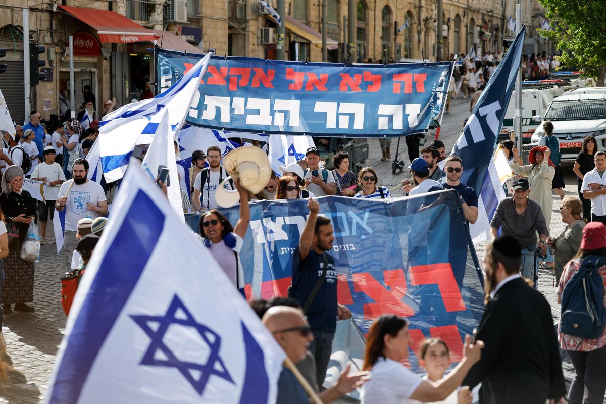 Israelis participate in the annual Jerusalem Day march in Jerusalem, May 14, 2026. REUTERS/Amir Cohen
