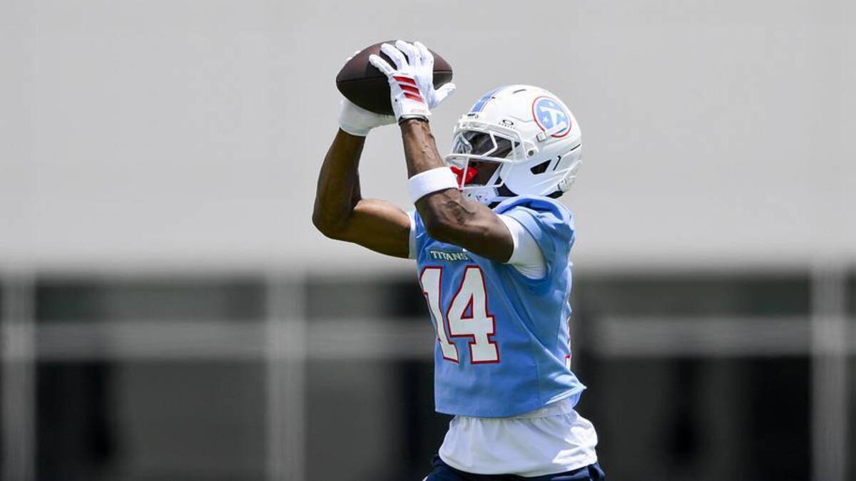  Jun 16, 2026; Nashville, TN, USA; Tennessee Titans wider receiver Carnell Tate (14) makes a catch during day 1 of mini-camp at Vanderbilt Health Football Center. | Steve Roberts-Imagn Images 