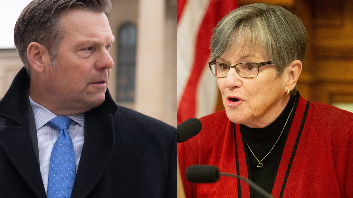 Gov. Laura Kelly, right, is attempting to defend a Kansas law from a Trump DOJ lawsuit after Attorney General Kris Kobach decided not to defend it.