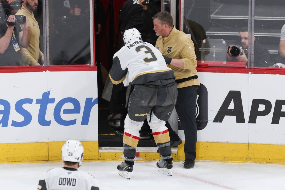  Vegas Golden Knights defenseman Brayden McNabb (3) is assisted off the ice after taking a puck to the face. Nathan Ray Seebeck-Imagn Images