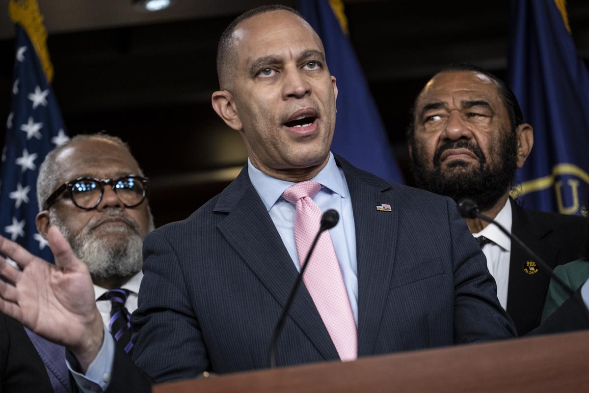 House Minority Leader Hakeem Jeffries (D-N.Y.) and members of the Congressional Black Caucus respond to a Supreme Court ruling that weakened the Voting Rights Act, in Washington on Wednesday, April 29, 2026. Jeffries tied the decision to the Trump administration's efforts to roll back initiatives promoting diversity, equity and inclusion. "This isn't even really the Roberts court, it's the Trump court," Jeffries said. With him are Rep. Benny Thompson (D-Miss.), left, and Rep. Al Green (D-Texas.) (Pete Marovich/The New York Times)
