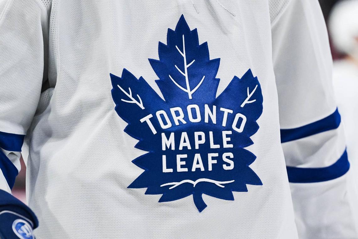  View of a Toronto Maple Leafs logo on a jersey worn by a member of the team. David Kirouac-Imagn Images