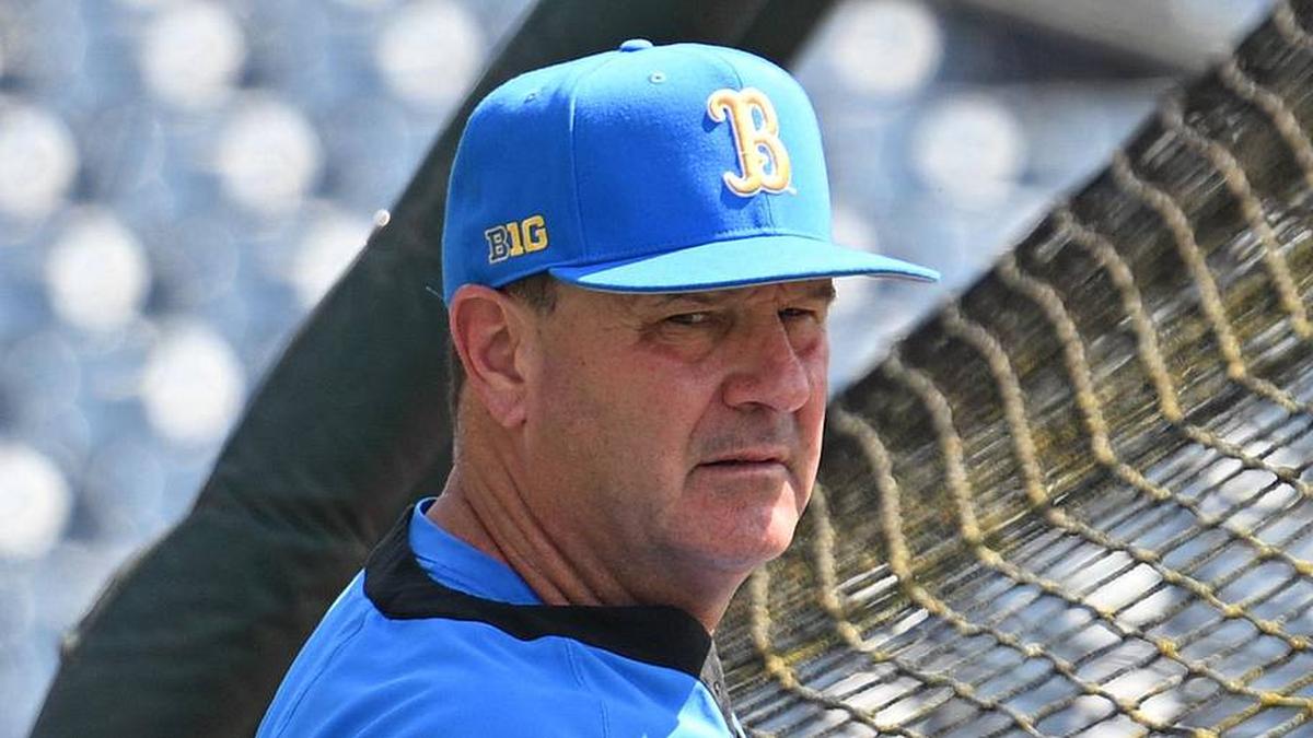  Jun 14, 2025; Omaha, Neb, USA; UCLA Bruins head coach John Savage watches the team warm up before the game against the Murray State Races at Charles Schwab Field. Mandatory Credit: Steven Branscombe-Imagn Images | Steven Branscombe-Imagn Images 