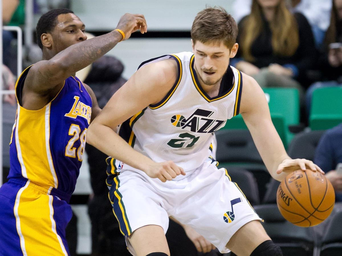 Jan 16, 2016; Salt Lake City, UT, USA; Los Angeles Lakers center Tarik Black (28) defends against Utah Jazz center Tibor Pleiss (21) during the second half at Vivint Smart Home Arena. The Jazz won 109-82. Mandatory Credit: Russ Isabella-USA TODAY Sports