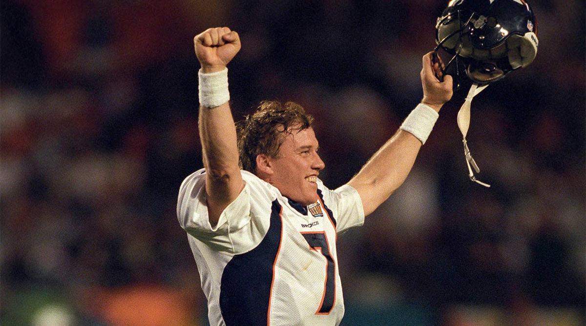  Denver Broncos quarterback John Elway celebrates on the field against the Atlanta Falcons during Super Bowl XXXIII at Dolphin Stadium. (Credit: RVR Photos-USA TODAY Sports)