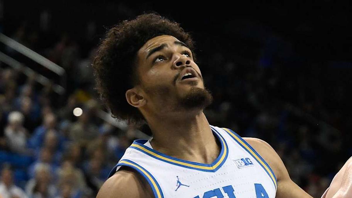  Mar 3, 2026; Los Angeles, California, USA; UCLA Bruins guard Eric Freeny (8) and Nebraska Cornhuskers forward Rienk Mast (51) jockey for rebounding position during the 1st half at Pauley Pavilion presented by Wescom Financial. Mandatory Credit: Robert Hanashiro-Imagn Images | Robert Hanashiro-Imagn Images 