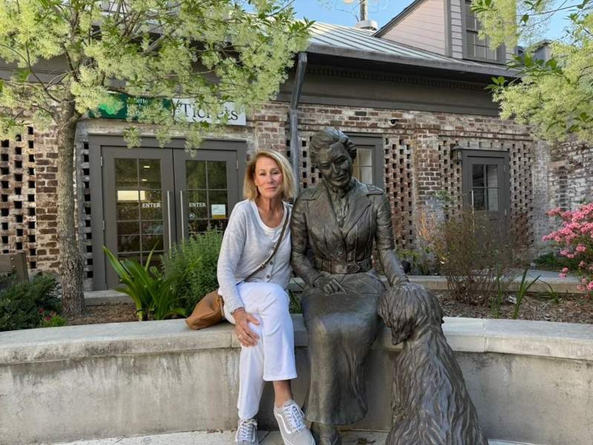  A moment beside the bronze sculpture of Juliette Gordon Low and her dog Scout at the Juliette Gordon Low Birthplace in Savannah. Photo credit: Kristen Mikles, manager, community relations 
