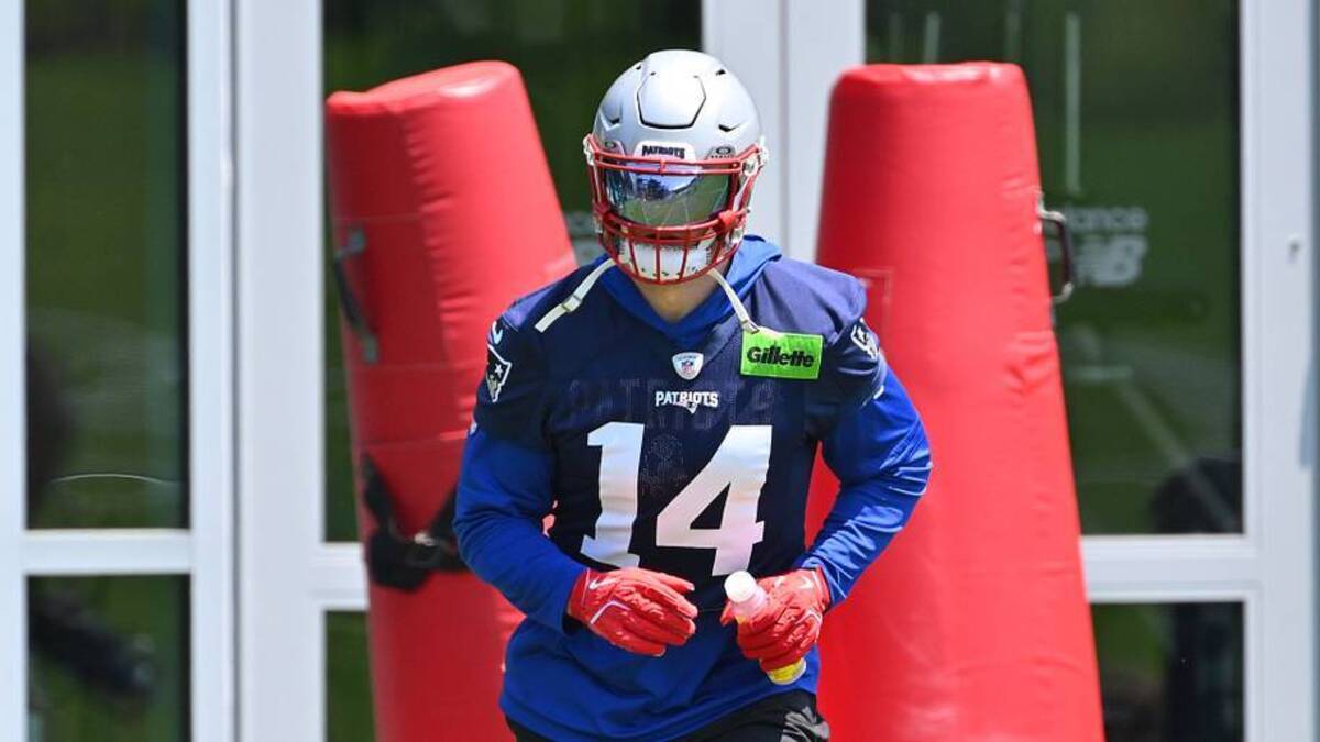  Jun 10, 2026; Foxborough, MA, USA; New England Patriots linebacker Robert Spillane (14) arrives at the practice field for minicamp at Gillette Stadium. Mandatory Credit: Eric Canha-Imagn Images | IMAGN IMAGES via Reuters Connect 