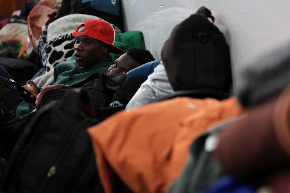 Displaced migrants shelter in a hall, following an escalation in anti-immigrant protests which heightened fears among foreign communities, in Kleinmond, South Africa, June 3, 2026. REUTERS/Esa Alexander