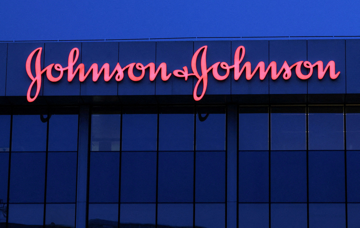 FILE PHOTO: The logo of Johnson & Johnson is seen on the top of a Brussels' office of the company in Diegem, Belgium September 21, 2023.  REUTERS/Yves Herman/File Photo