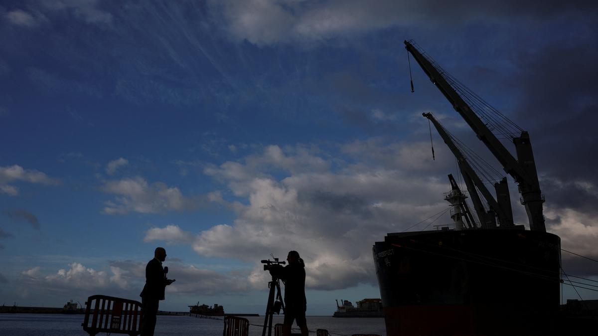Members of the media work at the port of Granadilla de Abona, Tenerife, Canary Islands, Spain, where the cruise ship MV Hondius hit by a deadly hantavirus outbreak, is expected to arrive, May 9, 2026. REUTERS/Hannah McKay