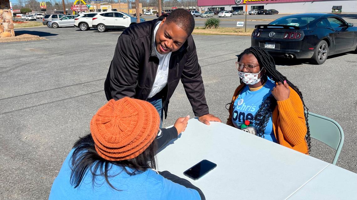 Democratic gubernatorial candidate Chris Jones speaks to campaign volunteers outside his campaign office in Pine Bluff, Ark. on February 19, 2022.