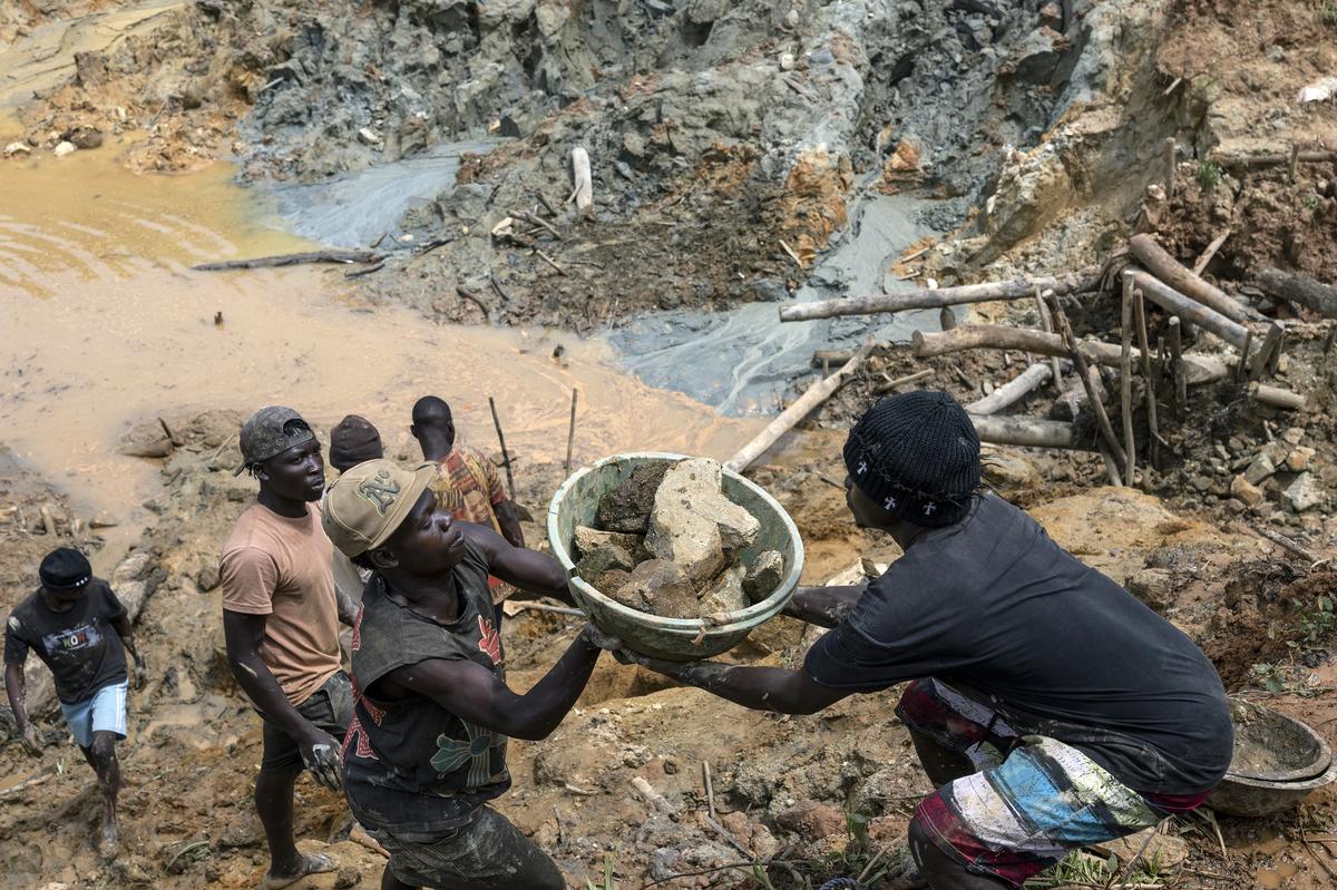 Workers at a gold mine in Mongbwalu, which is at the epicenter of the Ebola virus outbreak in Democratic Republic of Congo, May 26, 2026. In a remote gold mining town at the epicenter of the Ebola outbreak, medical workers struggle to beat back a surge of deaths and infections. (Arlette Bashizi/The New York Times)