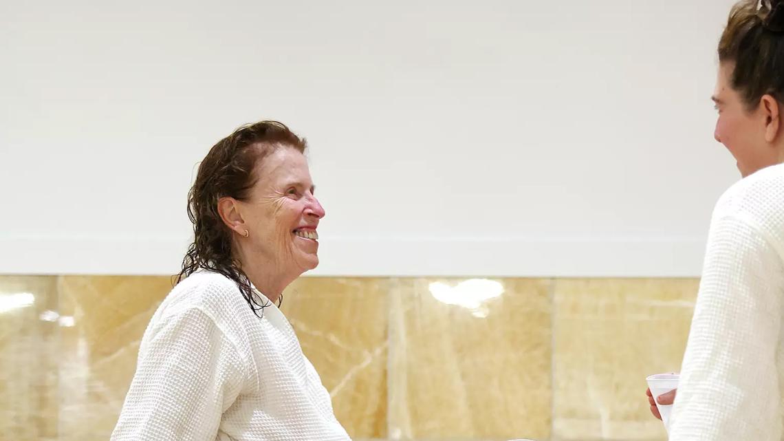 Pamela Redmond, left, relaxes with Los Angeles Times writer Deborah Vankin at Wi Spa in L.A.'s Koreatown neighborhood. (Christina House/Los Angeles Times/TNS)