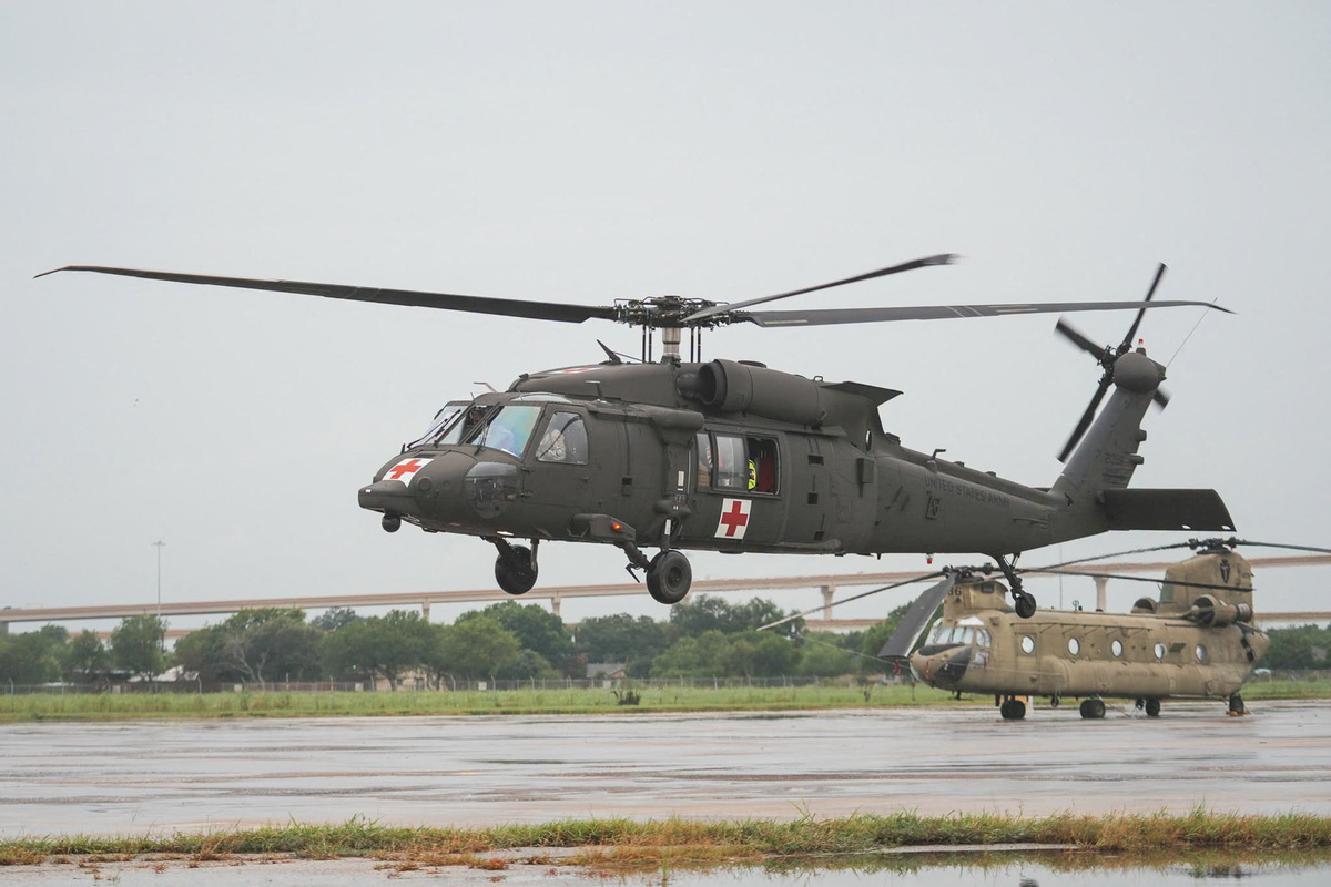 A helicopter flies as Texas Military Department provides support amid heavy rains and severe weather, in West-Central Texas, U.S., in this handout picture released July 16, 2026. Texas Military Department/Handout via REUTERS