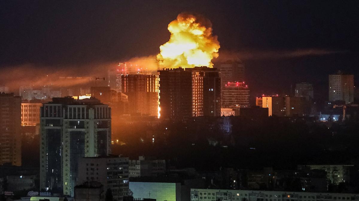 An explosion lights up the sky over the city during a Russian missile and drone strike, amid Russia's attack on Ukraine, in Kyiv, Ukraine June 2, 2026. REUTERS/Gleb Garanich