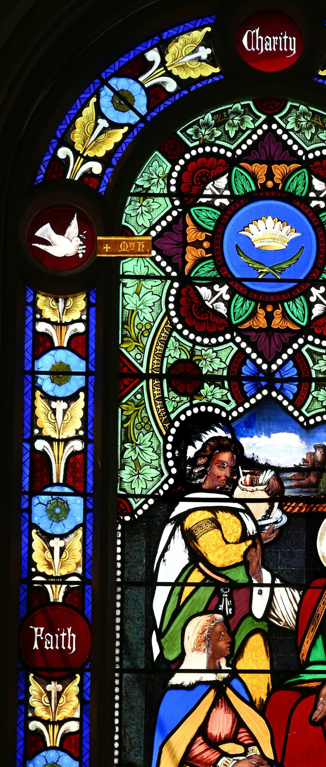  A stained-glass window that was part of a church shows a dark-skinned Jesus, which was unusual at the time. Michel M. Raguin 