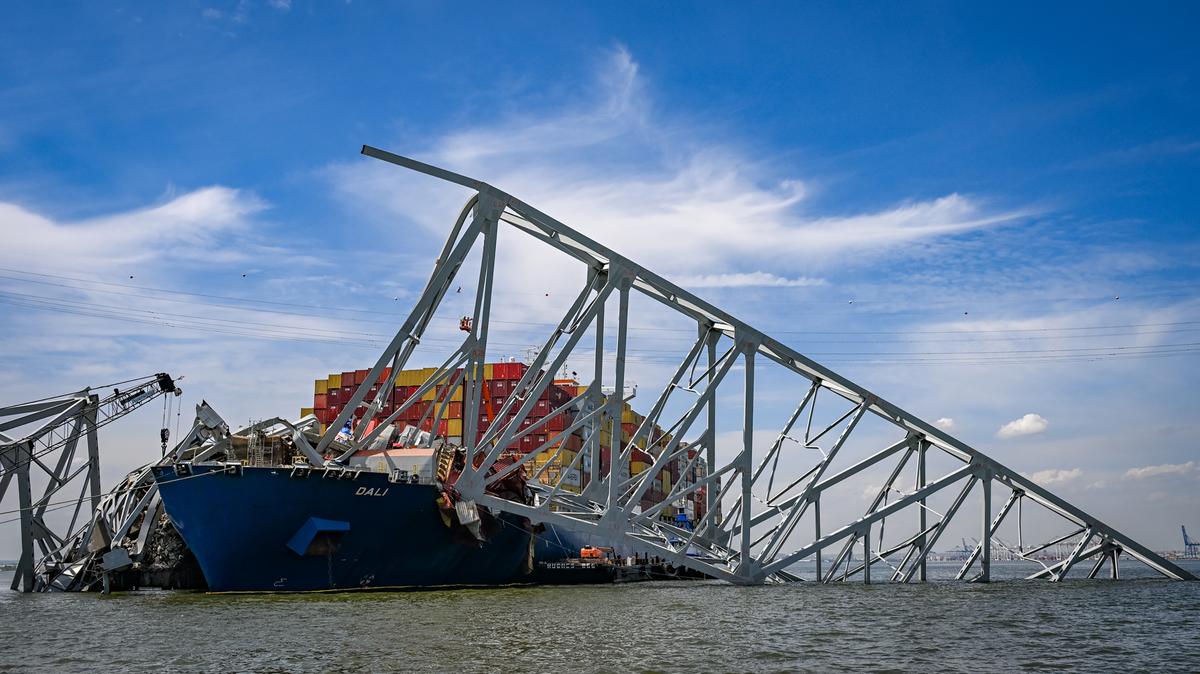 Salvage efforts continue as workers make preparations to remove the wreckage of the Francis Scott Key Bridge from the container ship Dali five weeks after the catastrophic collapse. (Jerry Jackson/The Baltimore Sun/TNS)
